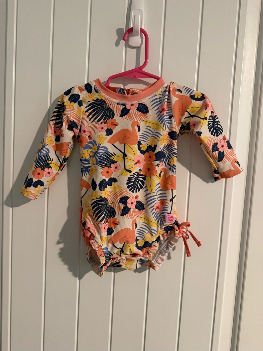 RuffleButts Flamingo Tropical One-Piece Swimsuit – 12–18M